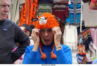 103 a0f. Peru - drive to cusco - market - cool llama cap