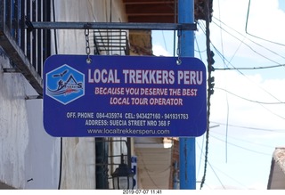 344 a0f. Peru - drive to cusco - LOCAL TREKKERS PERU sign