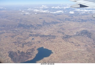 93 a0f. aerial - Peru - flight from Cusco to Lima - Andes Mountains - lake