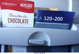 125 a0f. Peru - flight from Cusco to Lima - chocolate ad and safety card - which one is first, more important?