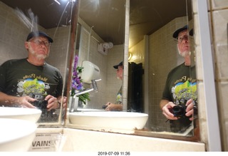 63 a0f. Peru - Lima - beach pier restaurant - mirrors + Adam