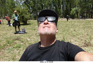 228 a0y. Argentina Eclipse Day - Adam looking at the partial eclipse