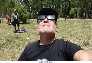 229 a0y. Argentina Eclipse Day - Adam looking at the partial eclipse