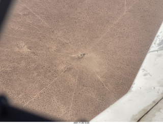 189 a19. aerial - flight from moab to phoenix - roads radiating from maybe a water source