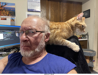 Adam with my cat Devin on my lap