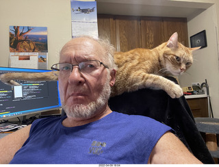 Adam with my cat Devin on my lap