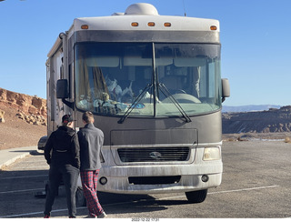 54 a1n. Utah - driving from moab to hanksville - Interstate 70 - big camper with dogs in the front