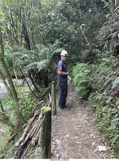 115 a1s. New Zealand - Spellbound Glowworm & Cave Tours - down to the cave - our guide