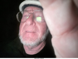 141 a1s. New Zealand - Spellbound Glowworm & Cave Tours - dark cave + Adam