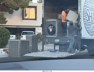 167 a2q. neighbor's house with air conditioner on the street with truck