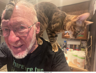 Adam with cat Pickle on my back