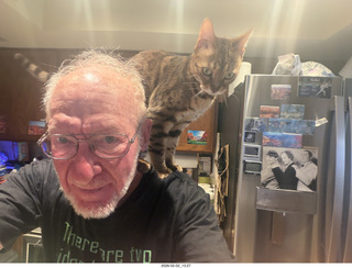 Adam with cat Pickle on my back