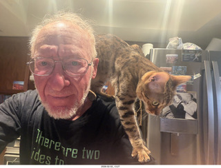 Adam with cat Pickle on my back